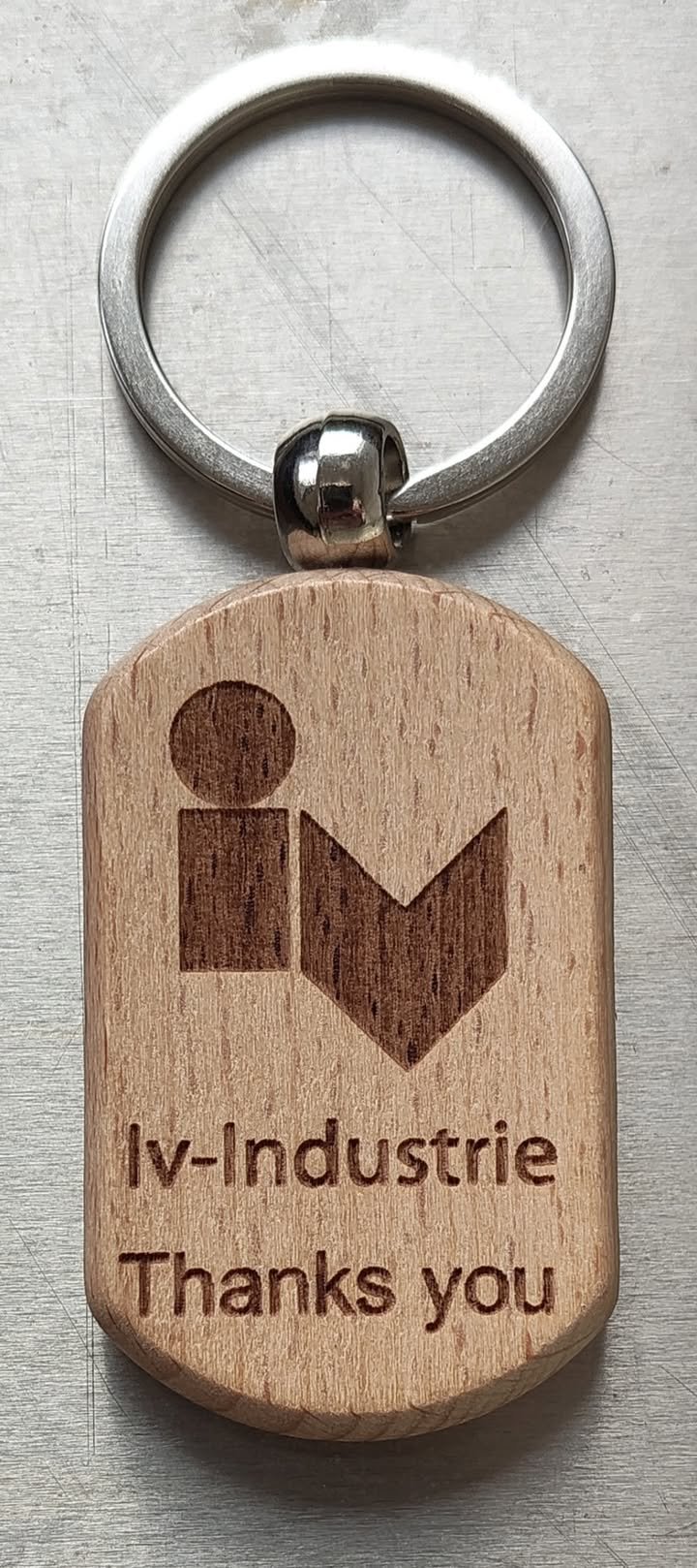 Sleutelhangers voor Iv-Industrie. Eindejaar feest gift